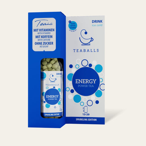  TEABALLS Energy - Dein natürlicher Energie-Kick product image showing a person preparing a cup of the energizing tea blend with boiling water and a tea infuser